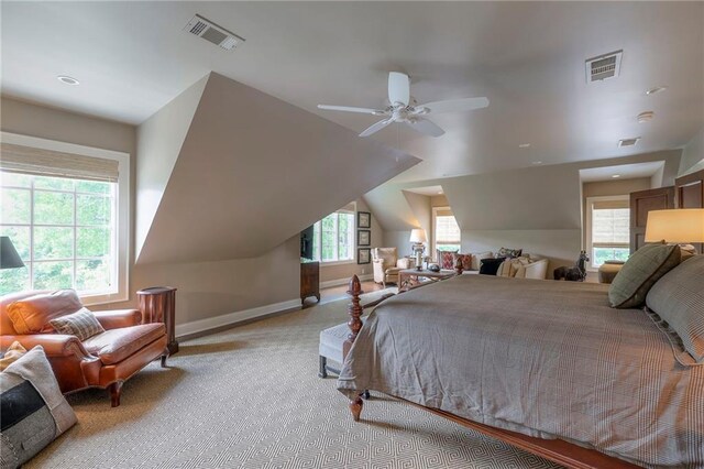 1055 W 54th St, Kansas City, MO 64112 - bedroom with carpet flooring, lofted ceiling, and ceiling fan