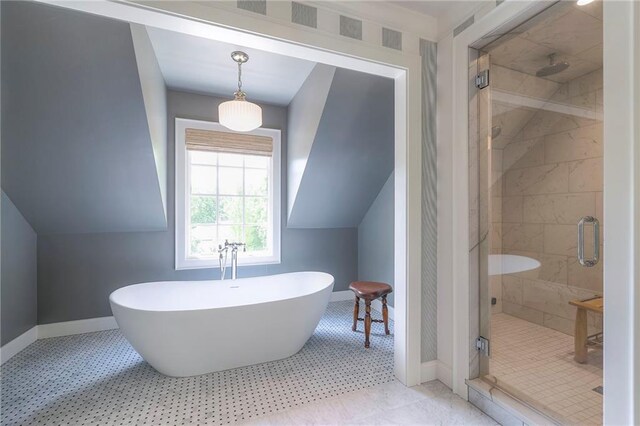 1055 W 54th St, Kansas City, MO 64112 - full bathroom featuring a stall shower and a freestanding bath