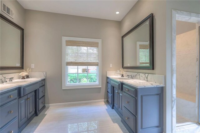 1055 W 54th St, Kansas City, MO 64112 - full bath featuring two vanities and a shower