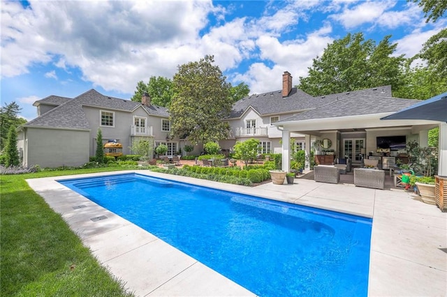 1055 W 54th St, Kansas City, MO 64112 - outdoor pool featuring an outdoor hangout area, a patio, and ceiling fan