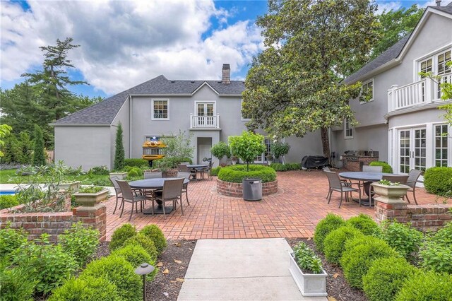 1055 W 54th St, Kansas City, MO 64112 - patio / terrace featuring outdoor dining space, a patio, french doors, and area for grilling