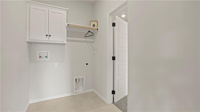 1300 Melissa Ct, Kearney, MO 64060 - laundry room with hookup for a washing machine, baseboards, electric dryer hookup, and cabinet space