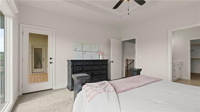 1300 Melissa Ct, Kearney, MO 64060 - bedroom with a raised ceiling, baseboards, and a ceiling fan