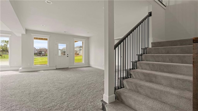 1300 Melissa Ct, Kearney, MO 64060 - carpeted entrance foyer featuring stairway, baseboards, and recessed lighting