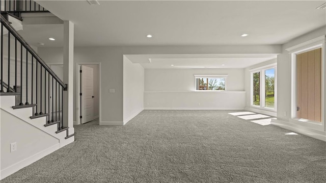 1300 Melissa Ct, Kearney, MO 64060 - unfurnished living room with carpet, stairs, baseboards, and recessed lighting