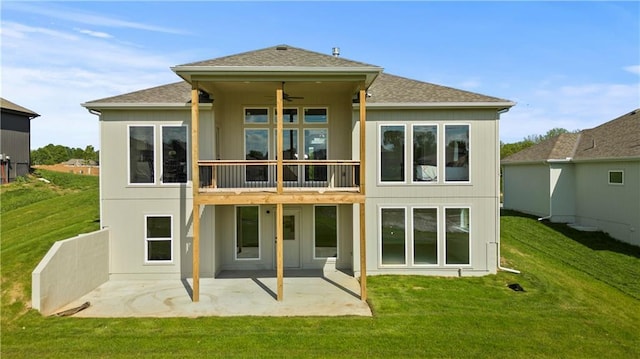1300 Melissa Ct, Kearney, MO 64060 - rear view of property featuring a patio, a ceiling fan, a yard, and a shingled roof