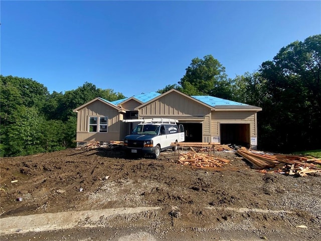 1300 Melissa Ct, Kearney, MO 64060 - unfinished property featuring a garage
