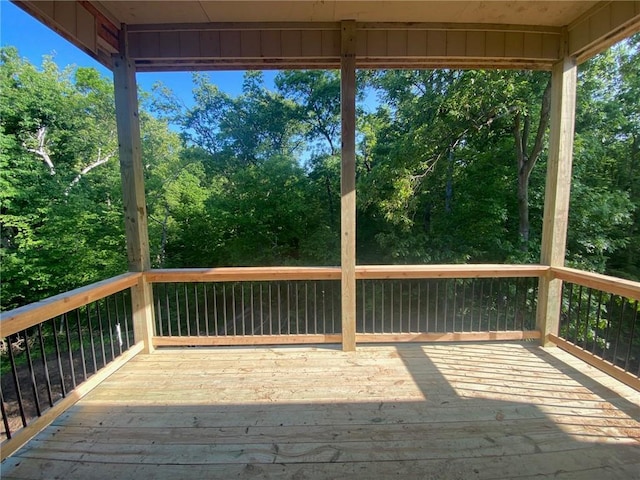 1300 Melissa Ct, Kearney, MO 64060 - wooden terrace with view of wooded area
