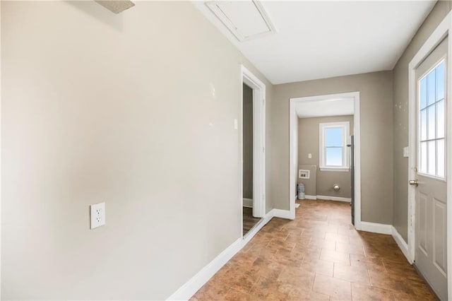 9318 Noland Rd, Lenexa, KS 66215 - doorway to outside featuring baseboards