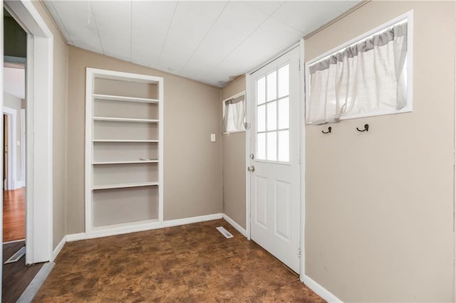 9318 Noland Rd, Lenexa, KS 66215 - entryway with built in shelves and baseboards