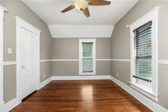 9318 Noland Rd, Lenexa, KS 66215 - spare room with vaulted ceiling, ceiling fan, hardwood / wood-style flooring, and baseboards