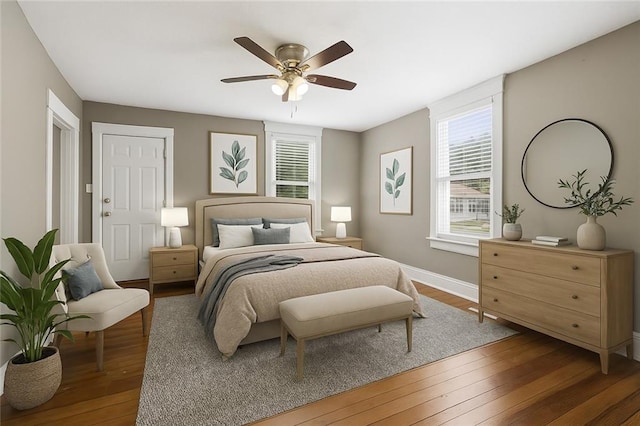 9318 Noland Rd, Lenexa, KS 66215 - bedroom with hardwood / wood-style flooring and a ceiling fan