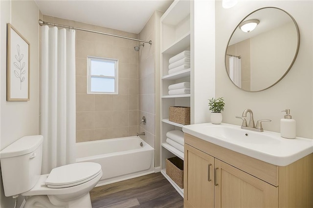 9318 Noland Rd, Lenexa, KS 66215 - full bath featuring vanity, shower / tub combo with curtain, and wood finished floors