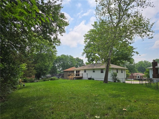 1506 N Holland Ct, Independence, MO 64056 - view of yard with a deck