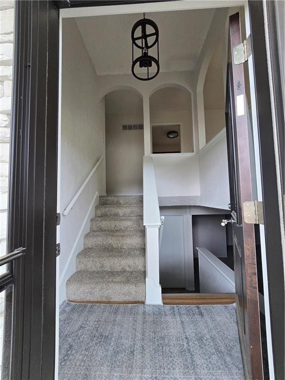 1506 N Holland Ct, Independence, MO 64056 - stairs featuring arched walkways