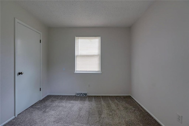 1506 N Holland Ct, Independence, MO 64056 - unfurnished room with carpet flooring and a textured ceiling