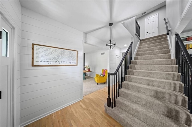 8102 W 153rd St, Overland Park, KS 66223 - stairway with wood finished floors and wood walls