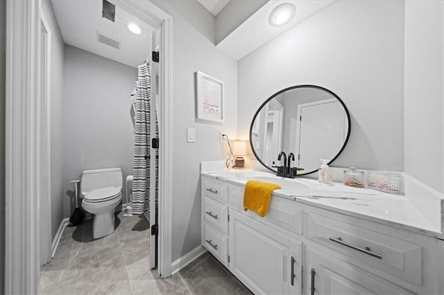 8102 W 153rd St, Overland Park, KS 66223 - full bathroom with vanity, toilet, and baseboards