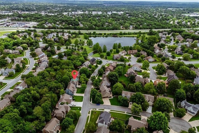 8102 W 153rd St, Overland Park, KS 66223 - aerial perspective of suburban area featuring a nearby body of water