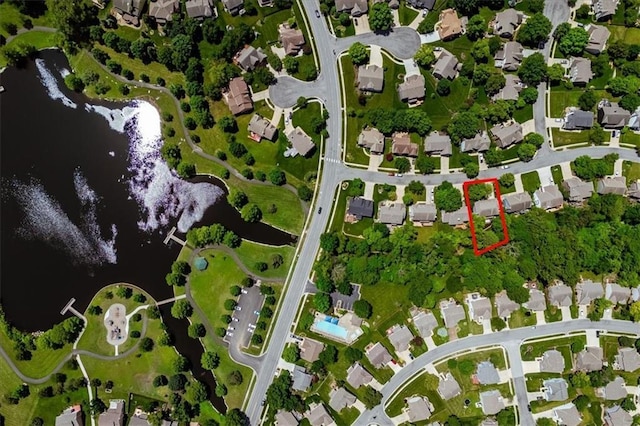 8102 W 153rd St, Overland Park, KS 66223 - aerial overview of property's location with a large body of water, nearby suburban area, and property parcel outlined