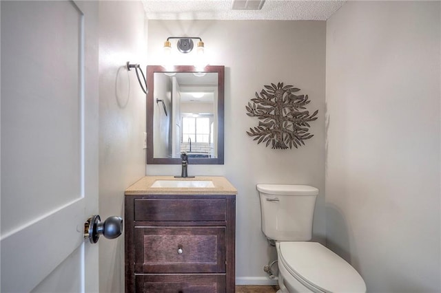 2406 Alabama St Unit 9D, Lawrence, KS 66046 - bathroom with vanity and a textured ceiling