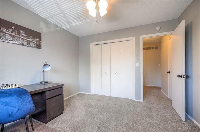 2406 Alabama St Unit 9D, Lawrence, KS 66046 - home office featuring carpet flooring and ceiling fan
