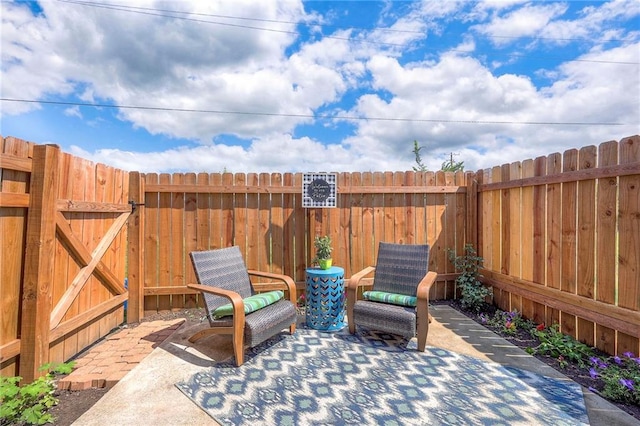 2406 Alabama St Unit 9D, Lawrence, KS 66046 - view of patio featuring a gate