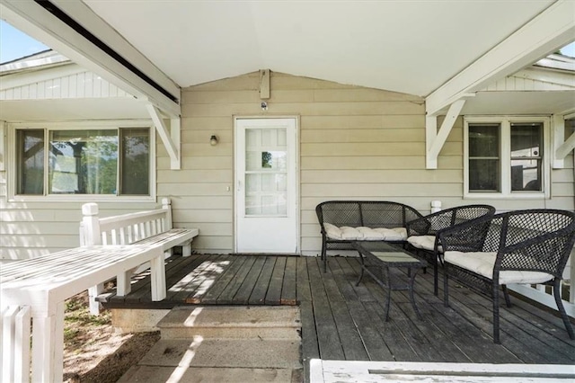 8700 Independence Ave, Kansas City, MO 64125 - wooden deck featuring outdoor lounge area