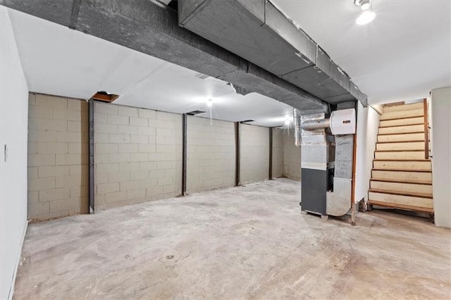 8700 Independence Ave, Kansas City, MO 64125 - unfinished below grade area with heating unit and stairway