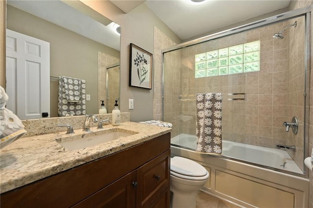 8 Apache Dr, Lake Winnebago, MO 64034 - full bath with vanity, toilet, shower / bath combination with glass door, and tile patterned floors