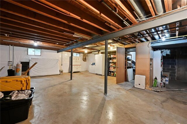 8 Apache Dr, Lake Winnebago, MO 64034 - basement with freestanding refrigerator