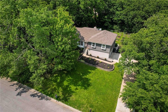 8 Apache Dr, Lake Winnebago, MO 64034 - view of subject property featuring a heavily wooded area