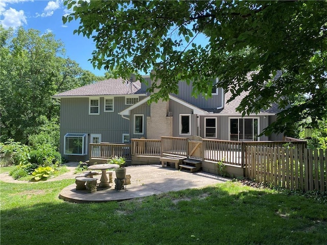 8 Apache Dr, Lake Winnebago, MO 64034 - back of house featuring a patio area, a wooden deck, and a shingled roof