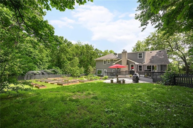 8 Apache Dr, Lake Winnebago, MO 64034 - view of yard with a garden and a patio area