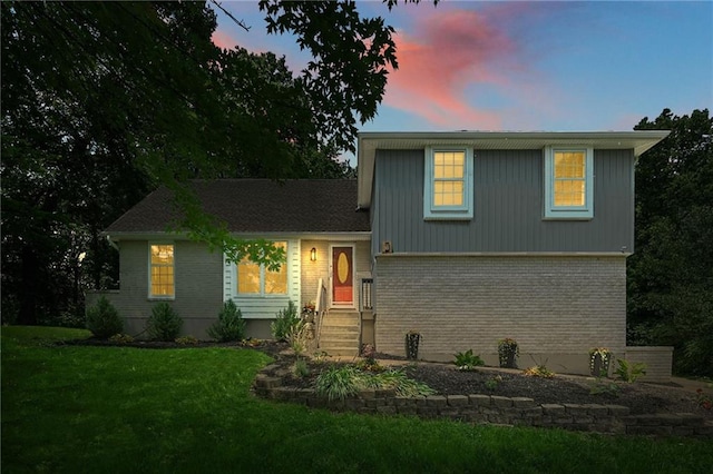 8 Apache Dr, Lake Winnebago, MO 64034 - split level home featuring brick siding and a front lawn