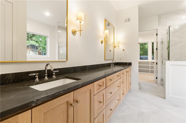 18568 W 180th Ct, Olathe, KS 66062 - full bath featuring a stall shower, double vanity, and marble look tiles