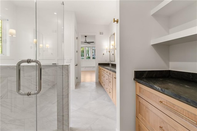 18568 W 180th Ct, Olathe, KS 66062 - full bath featuring vanity, a shower stall, ceiling fan, and marble finish floors