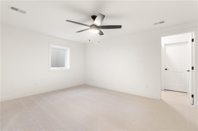 18568 W 180th Ct, Olathe, KS 66062 - spare room with light carpet, baseboards, and ceiling fan