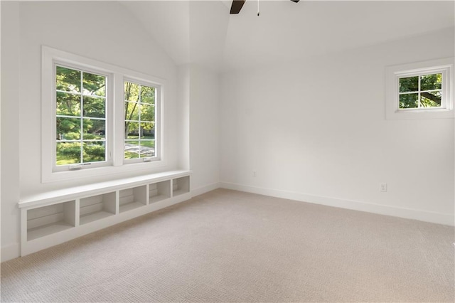 18568 W 180th Ct, Olathe, KS 66062 - spare room featuring light carpet, healthy amount of natural light, ceiling fan, baseboards, and lofted ceiling