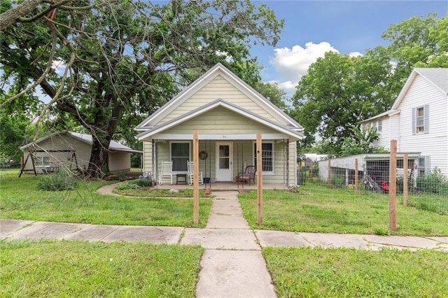 211 S 4th St, Fredonia, KS 66736 - view of front of home with a porch
