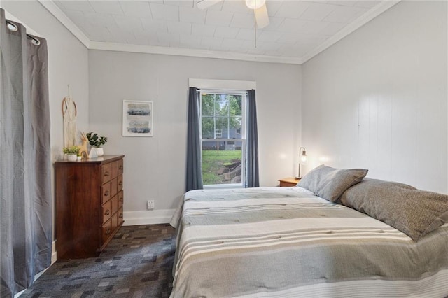 211 S 4th St, Fredonia, KS 66736 - bedroom featuring ornamental molding, dark colored carpet, baseboards, and ceiling fan