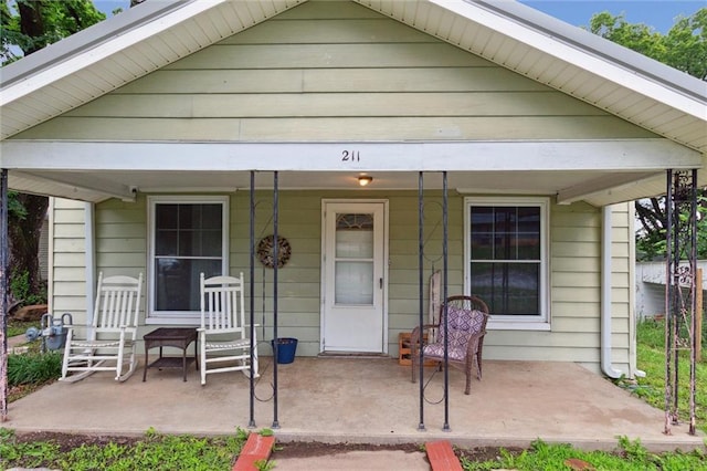 211 S 4th St, Fredonia, KS 66736 - view of front of property featuring a porch