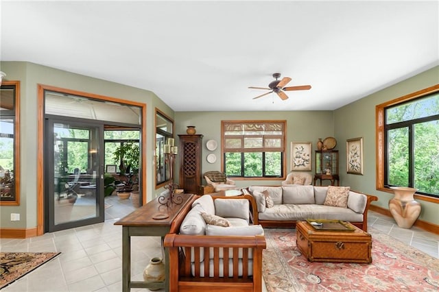 1672 N 1st Rd, Baldwin City, KS 66006 - living area featuring a ceiling fan, baseboards, and light tile patterned floors