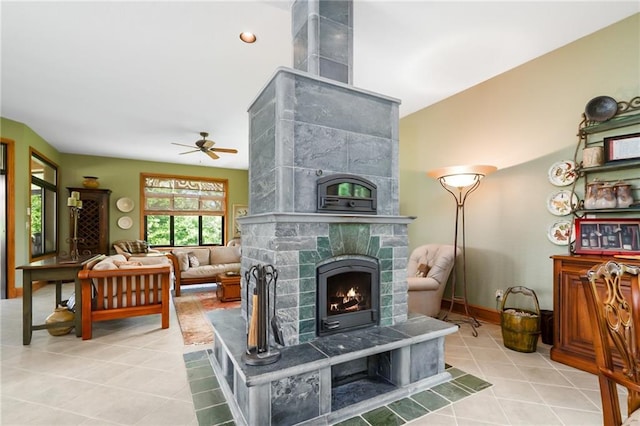 1672 N 1st Rd, Baldwin City, KS 66006 - tiled living room featuring a fireplace, ceiling fan, and baseboards