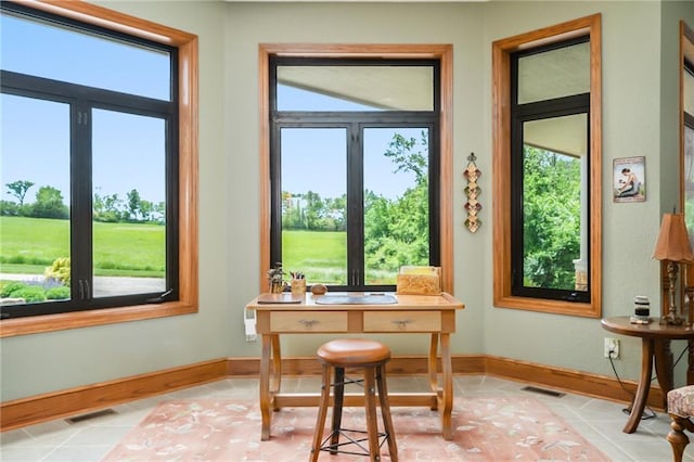 1672 N 1st Rd, Baldwin City, KS 66006 - office with light tile patterned floors, plenty of natural light, and baseboards