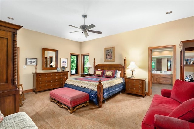 1672 N 1st Rd, Baldwin City, KS 66006 - bedroom featuring light colored carpet, ceiling fan, ensuite bath, and baseboards