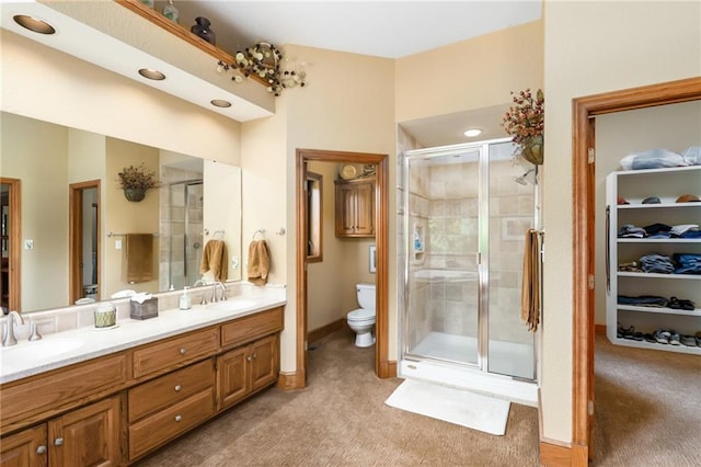 1672 N 1st Rd, Baldwin City, KS 66006 - bathroom with double vanity, a stall shower, toilet, and baseboards