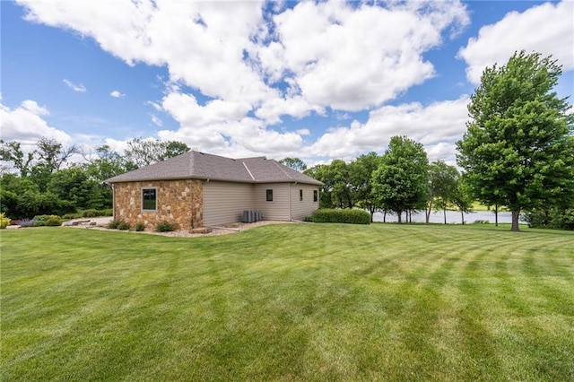 1672 N 1st Rd, Baldwin City, KS 66006 - view of grassy yard with central AC unit