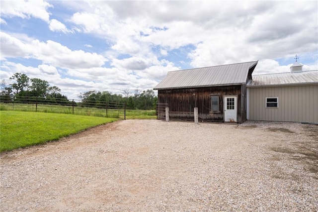 1672 N 1st Rd, Baldwin City, KS 66006 - view of pole building featuring driveway
