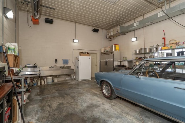1672 N 1st Rd, Baldwin City, KS 66006 - garage featuring concrete block wall